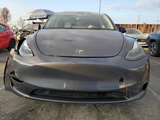 Photo 5 from auction – 2023 TESLA MODEL Y with VIN 7SAYGAEE2PF912152