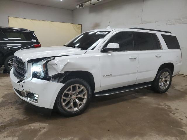 GMC YUKON SLE 2019 with VIN 1GKS2AKC9KR352576 - Photo from auction