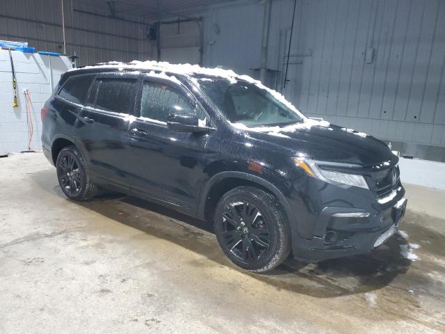 Photo 4 from auction – 2021 HONDA PILOT BLAC with VIN 5FNYF6H76MB004227
