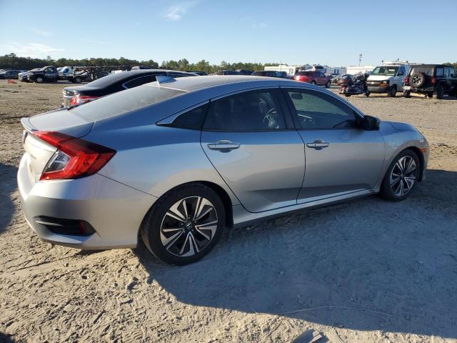 Photo 3 from auction – 2016 HONDA CIVIC EX with VIN 19XFC1F34GE042021