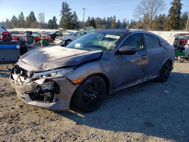 HONDA CIVIC LX 2018 with VIN 2HGFC2F51JH608964 - Photo from auction