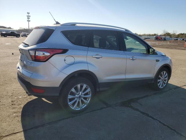 Photo 3 from auction – 2018 FORD ESCAPE TIT with VIN 1FMCU9J97JUC98801