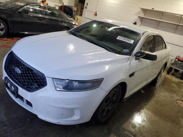 FORD TAURUS POL 2016 with VIN 1FAHP2MK0GG136867 - Photo from auction