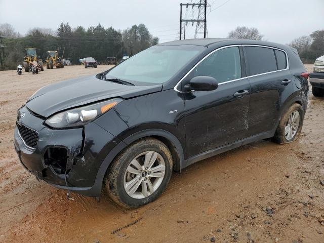 KIA SPORTAGE L 2018 with VIN KNDPMCAC8J7390772 - Photo from auction