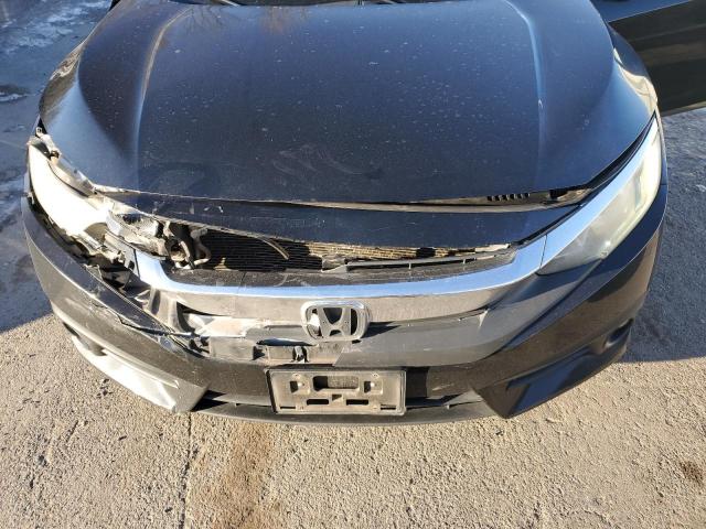 Photo 11 from auction – 2016 HONDA CIVIC EXL with VIN 19XFC1F73GE023057