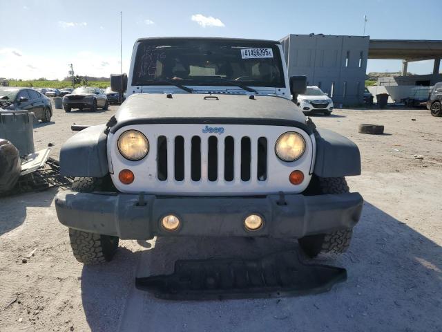 Photo 5 from auction – 2012 JEEP WRANGLER U with VIN 1C4BJWDG4CL260176