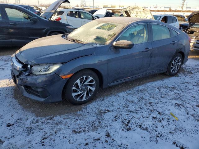 HONDA CIVIC EX 2018 with VIN 19XFC2F71JE028884 - Photo from auction