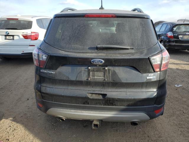 Photo 6 from auction – 2018 FORD ESCAPE SE with VIN 1FMCU9GD4JUD55757