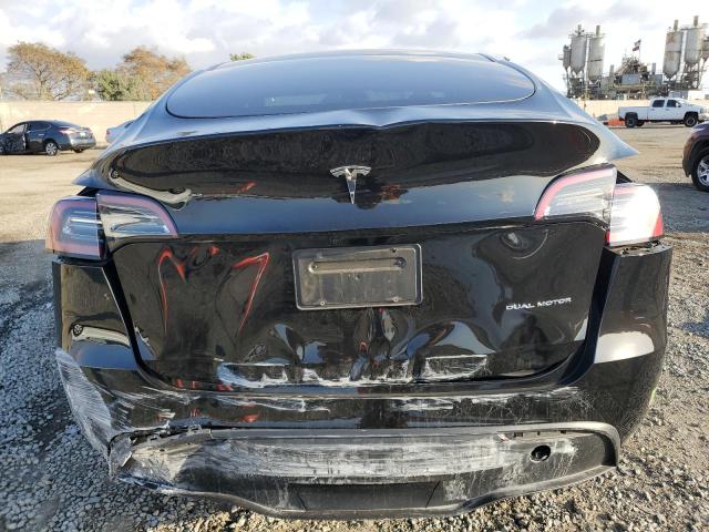 Photo 6 from auction – 2023 TESLA MODEL Y with VIN 7SAYGDEE3PA055810
