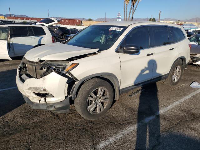 HONDA PILOT LX 2017 with VIN 5FNYF5H15HB026134 - Photo from auction