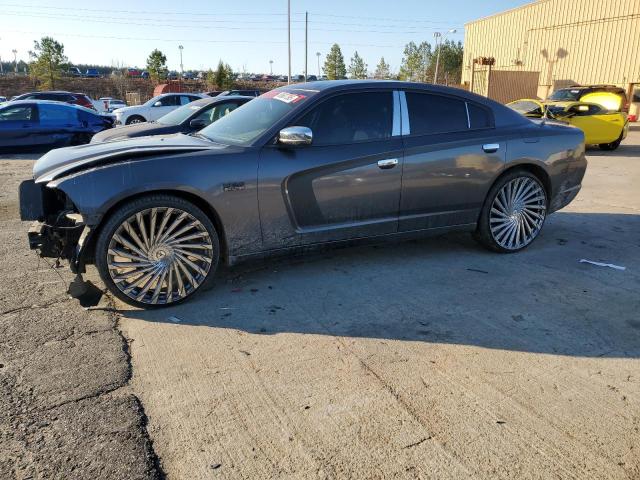 DODGE CHARGER PO 2013 with VIN 2C3CDXAT2DH711322 - Photo from auction