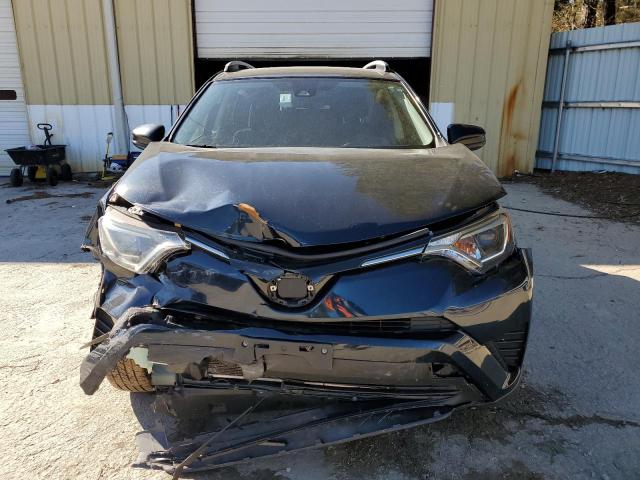 Photo 5 from auction – 2018 TOYOTA RAV4 LE with VIN JTMZFREV3JJ205497