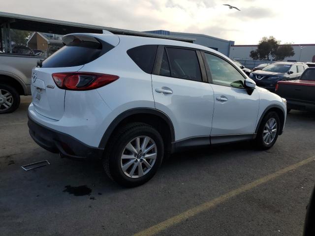Photo 3 from auction – 2016 MAZDA CX-5 TOURI with VIN JM3KE2CY8G0921200