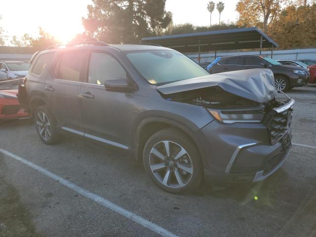 HONDA PILOT TOUR 2023 with VIN 5FNYG2H76PB015285 - Photo from auction