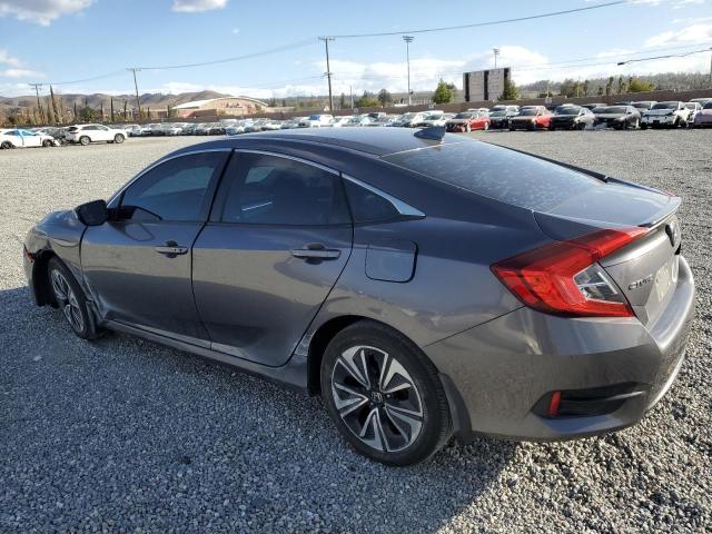 Photo 2 from auction – 2016 HONDA CIVIC EX with VIN 2HGFC1F39GH630910