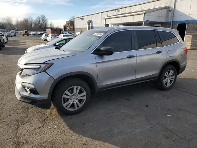 HONDA PILOT LX 2016 with VIN 5FNYF6H19GB093355 - Photo from auction