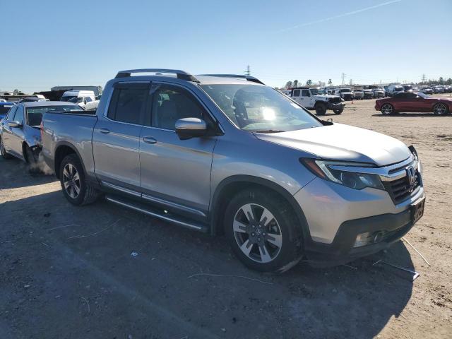 Photo 4 from auction – 2017 HONDA RIDGELINE with VIN 5FPYK2F63HB008277