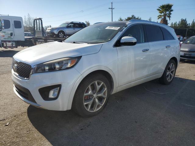 KIA SORENTO SX 2016 with VIN 5XYPK4A58GG074829 - Photo from auction