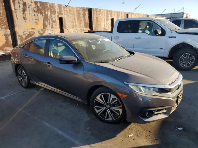 Photo 4 from auction – 2017 HONDA CIVIC EXL with VIN 2HGFC1F76HH649872
