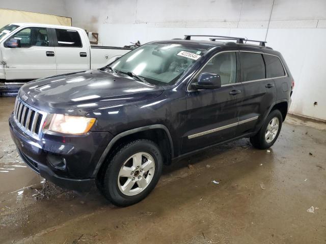 JEEP GRAND CHER 2011 with VIN 1J4RR4GG1BC512613 - Photo from auction