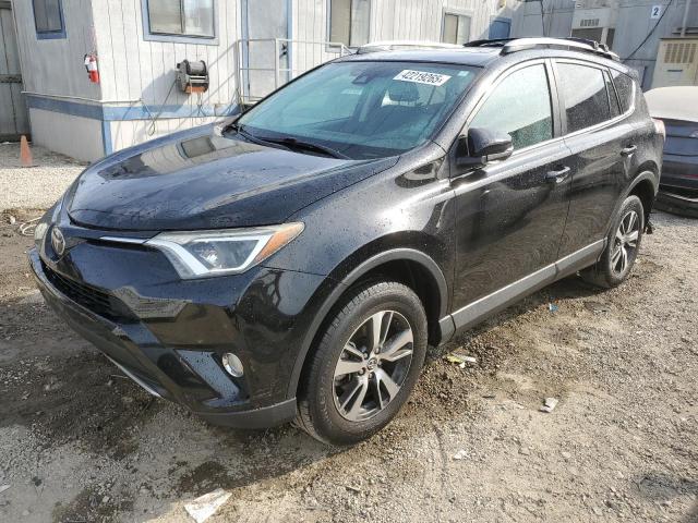 TOYOTA RAV4 XLE 2017 with VIN 2T3WFREV5HW369624 - Photo from auction