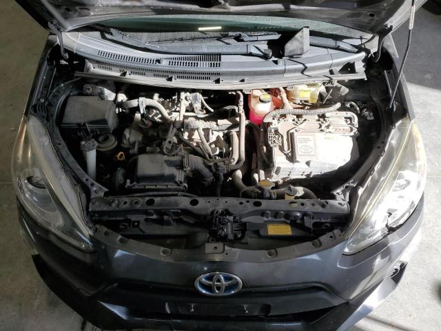 Photo 11 from auction – 2015 TOYOTA PRIUS C with VIN JTDKDTB36F1584218