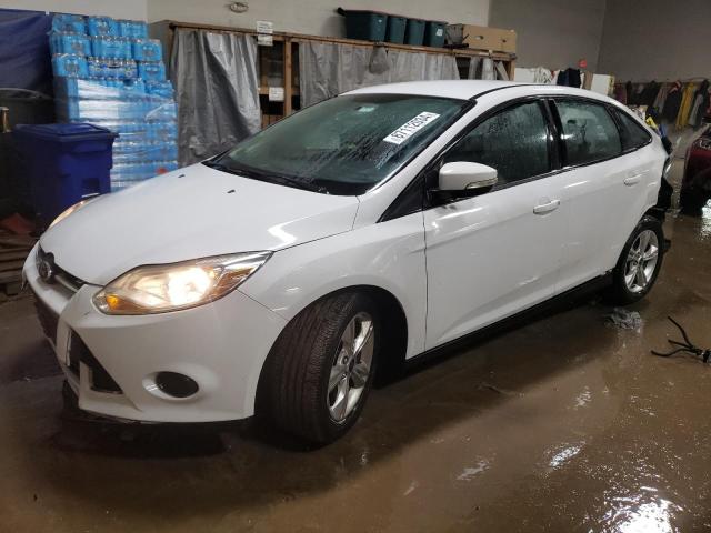 FORD FOCUS SE 2014 with VIN 1FADP3F24EL360648 - Photo from auction