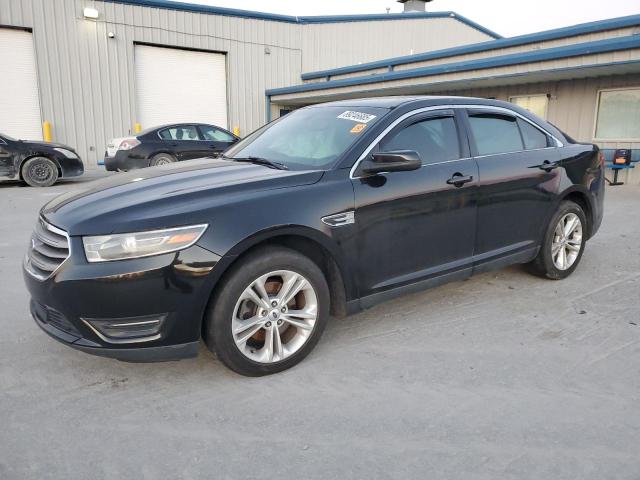 FORD TAURUS SEL 2014 with VIN 1FAHP2E89EG187090 - Photo from auction