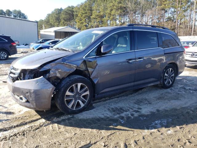 HONDA ODYSSEY TO 2015 with VIN 5FNRL5H97FB009657 - Photo from auction