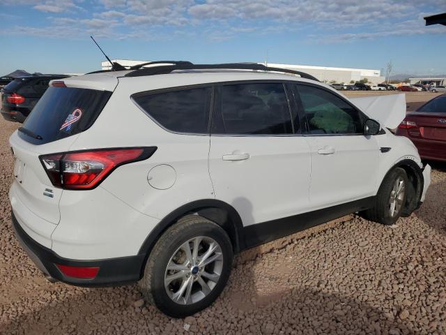 Photo 3 from auction – 2018 FORD ESCAPE with VIN 1FMCU9HD3JUC80404