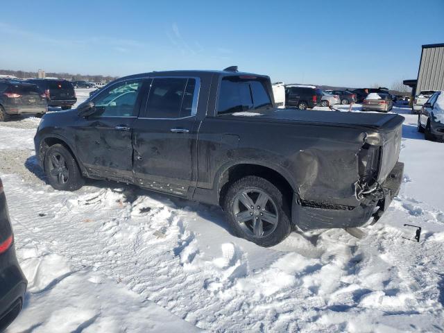 Photo 2 from auction – 2022 HONDA RIDGELINE with VIN 5FPYK3F70NB011695
