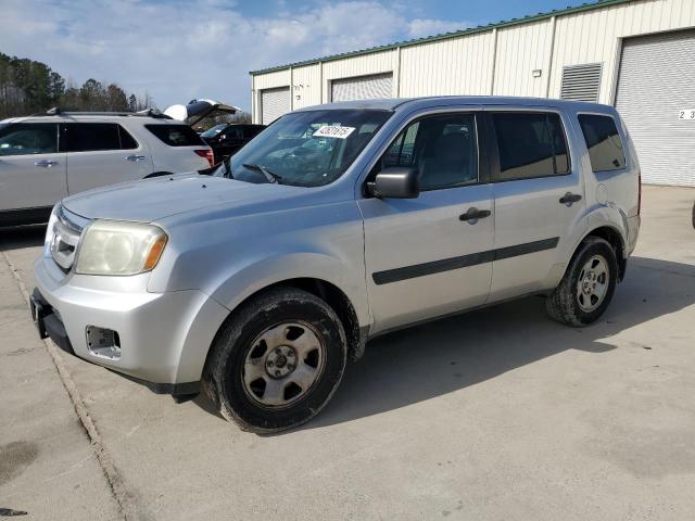 HONDA PILOT LX 2011 with VIN 5FNYF4H22BB016722 - Photo from auction