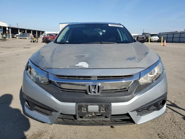 Photo 5 from auction – 2016 HONDA CIVIC LX with VIN 2HGFC2F54GH554410