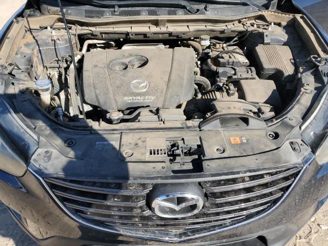 Photo 12 from auction – 2016 MAZDA CX-5 SPORT with VIN JM3KE2BY0G0800436