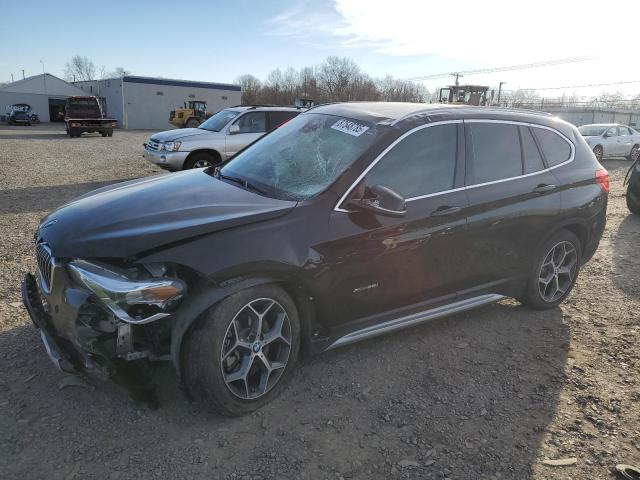 BMW X1 XDRIVE2 2016 with VIN WBXHT3C33GP884084 - Photo from auction