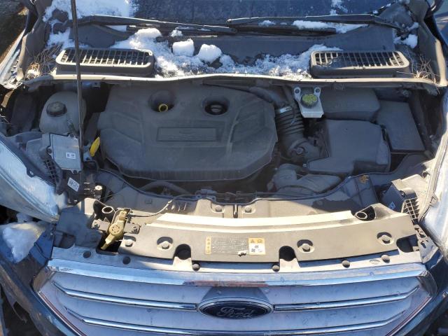 Photo 11 from auction – 2018 FORD ESCAPE TIT with VIN 1FMCU9J98JUC19121