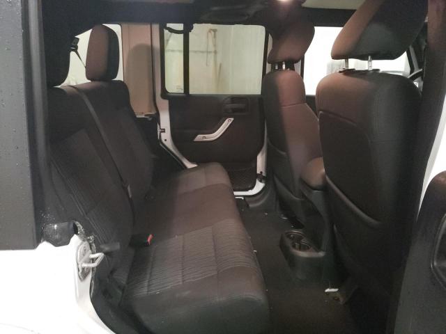 Photo 11 from auction – 2011 JEEP WRANGLER U with VIN 1J4BA5H10BL548799