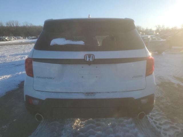Photo 6 from auction – 2024 HONDA PASSPORT E with VIN 5FNYF8H52RB014593