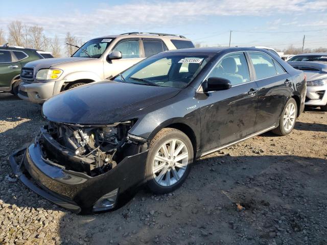 TOYOTA CAMRY HYBR 2012 with VIN 4T1BD1FK6CU021813 - Photo from auction