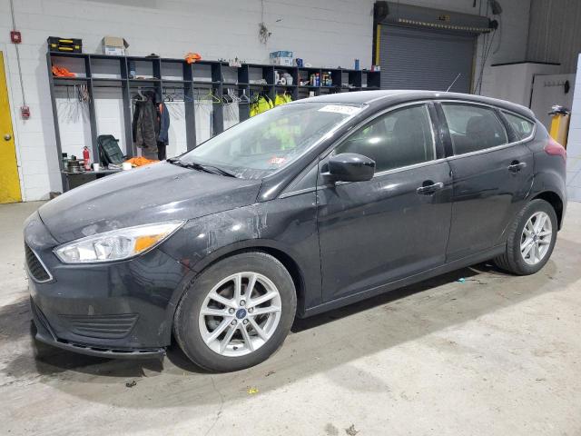 FORD FOCUS SE 2018 with VIN 1FADP3K24JL264115 - Photo from auction
