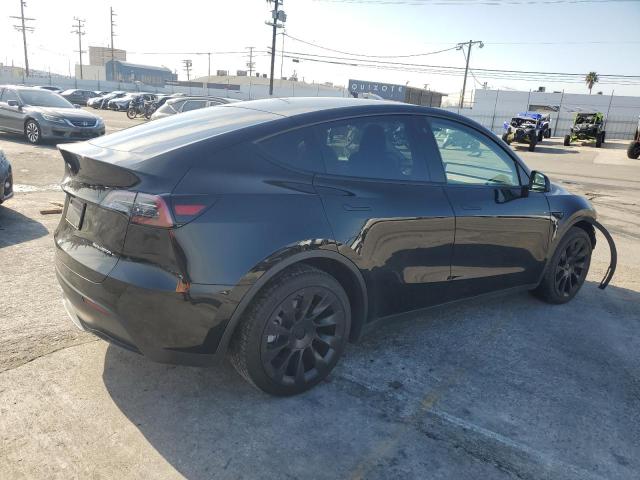 Photo 3 from auction – 2023 TESLA MODEL Y with VIN 7SAYGDEE2PA050565