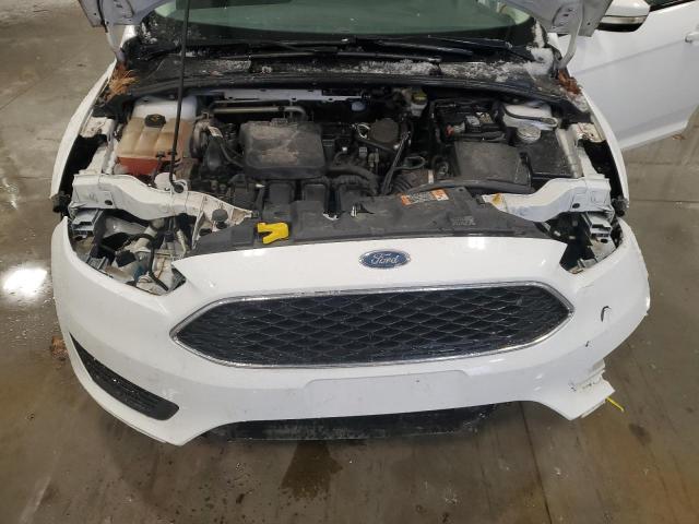 Photo 11 from auction – 2016 FORD FOCUS SE with VIN 1FADP3K22GL208571