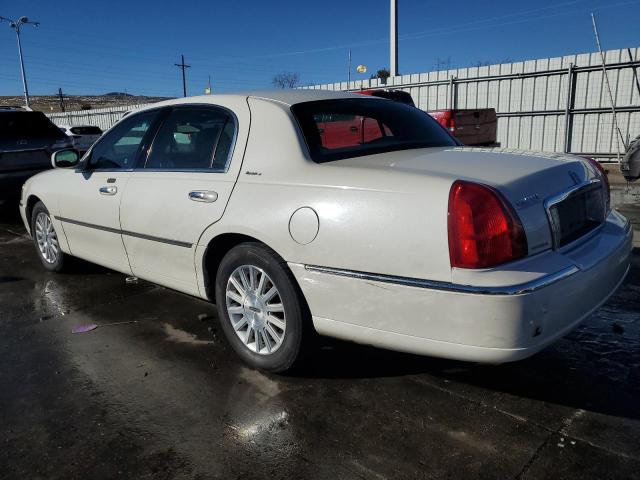 Photo 2 from auction – 2003 LINCOLN TOWN CAR E with VIN 1LNHM81W73Y669991