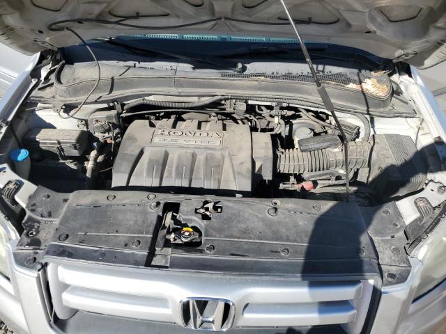 Photo 12 from auction – 2006 HONDA PILOT EX with VIN 2HKYF18566H530766