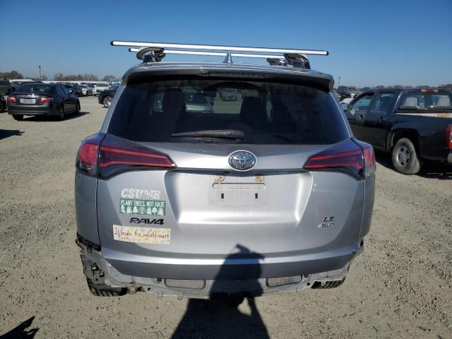 Photo 6 from auction – 2018 TOYOTA RAV4 LE with VIN 2T3BFREV1JW758460