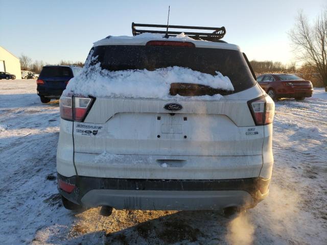Photo 6 from auction – 2018 FORD ESCAPE SE with VIN 1FMCU9GD1JUC46365