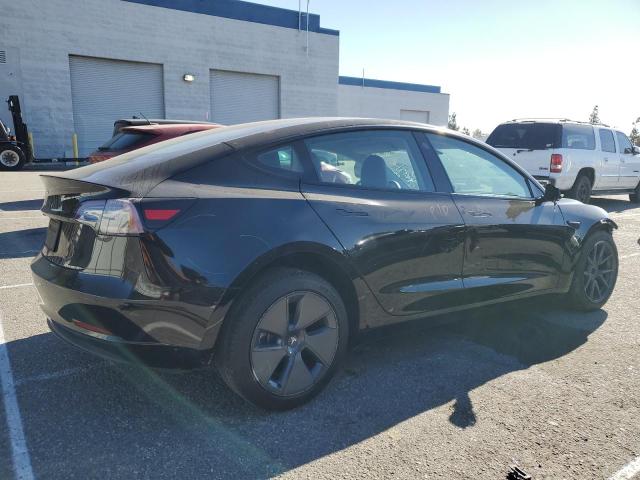 Photo 3 from auction – 2021 TESLA MODEL 3 with VIN 5YJ3E1EA7MF875556