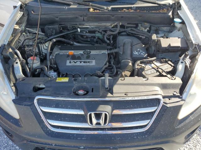 Photo 12 from auction – 2005 HONDA CR-V LX with VIN JHLRD68515C005506