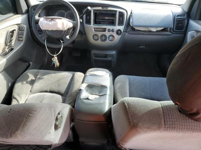 Photo 8 from auction – 2004 MAZDA TRIBUTE LX with VIN 4F2YZ04114KM28035