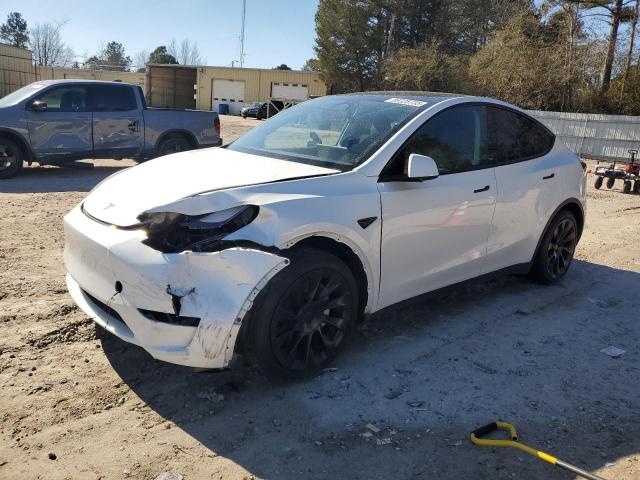 TESLA MODEL Y 2023 with VIN 7SAYGDEE2PF752209 - Photo from auction